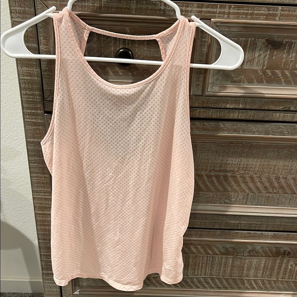 NIKE Light Pink Tank Top with Rounded Neckline and Relaxed Fit